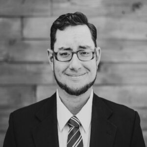 Agency team-page photo captioned Christopher Kuntz